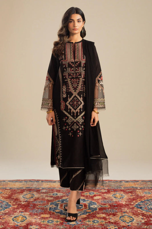 This long black kameez displays a beautiful fusion between traditional and modern cross-stitch embroidery By Zara Shahjahan